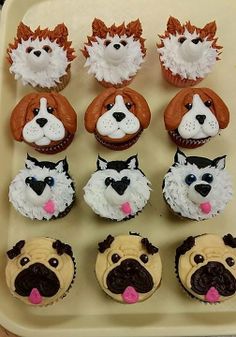 there are cupcakes with dogs on them