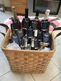 a basket filled with lots of bottles of wine