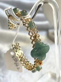 "14K gold plated Lucky Clover Guatemala blue Lucky Clover Jadeite Jade Open End Bracelet Bangle  四叶草翡翠金手镯 Original certification is included.   Approx. Dimension of the center lucky clover: 16.7mm x 13.5mm Maximum size fit of wrist: 50mm in diameter US domestic shipping is Free!  We will ship this item USPS Ground package. Comes with the original certification and a beautiful gift pouch.    Guaranteed A-stock Natural Jadeite Jade. 7-Day after delivery satisfaction return/exchange is in place if you are not satisfied with the item.  Each piece is unique, and it is One and Only！ Do not miss out. HOW TO PLACE AN ORDER： 1. Review and read all information provided in the listing before placing an order. Feel free to message me for any questions you may have. 2. Select the item you are intereste