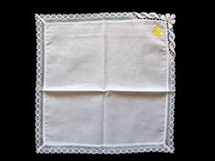 New old stock - in the original packaging. White lace edged handkerchief with one fancy corner. Cotton batiste. Label reads "Rosdale batiste continentals". 1970s-1980s. Measures 25 x 25 cm (10") Mint condition, as new. It's been stored near a perfume sachet and does smell of perfume. See my other vintage handkerchiefs at: https://www.etsy.com/au/shop/LouisaAmeliaJane?ref=seller-platform-mcnav&section_id=11578561 Classic Handkerchiefs With Lace Trim As Gift, Perfume Sachet, Vintage Handkerchiefs, Lace Edging, Vintage Lace, White Lace, Mint Condition, Scarf Wrap, Scarf Accessory