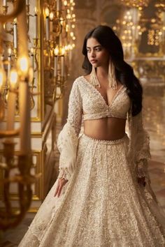 This Ivory Gold Indian Bridal Floral Lehenga set highlights ivory string, sequin, and pearl weaving in a flower design. The plunging neck area shows pearls along the neck area and abdomen. The sleeves of the shirt have misrepresented pearl tufts at the fix.
For more details contact us on our WhatsApp 
+1 (732) 351-5426
Visit our website 
www.nameerabridal.com
#bridaldressonline #bridaloutfit #usabridalgown #usabridaldress #onlinebridaldress #pakistaniwedding   #pakistaniweddingdress #latestbrida