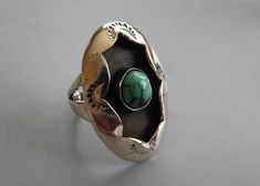 Shadow Box Turquoise Ring, Zuni Turquoise Ring, Native American Turquoise Ring, Southwest Turquoise Ring, Shadow Box Ring, Gift For Her This listing is for a pretty vintage Native American sterling silver ring with a small turquoise gemstone, size 5-1/2.  This ring was most likely made by an artist from the Zuni Pueblo in New Mexico.  It has a small bezel set blue green turquoise gemstone, with brown matrix, which I believe is from Arizona.  The band is a plain split style.  The setting is a sha Artisan Handmade Turquoise Ring For Wedding, Artisan Handmade Turquoise Wedding Ring, Southwestern Style Turquoise Ring Gift, Artisan Turquoise Open Ring As Gift, Artisan Turquoise Open Ring Gift, Artisan Turquoise Open Ring For Gift, Artisan Turquoise Open Ring, Unique Turquoise Ring For Gift, Southwestern Style Turquoise Open Ring Gift