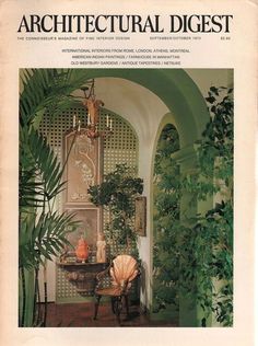 the front cover of an architectural digest magazine, with plants and furniture in green hues