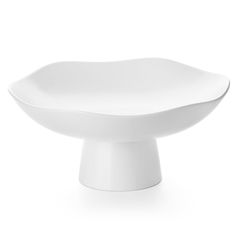 a white bowl sitting on top of a table