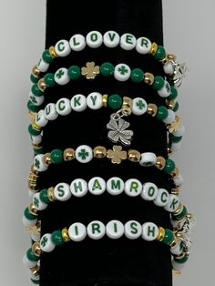 Please choose the bracelet (or multiple) you prefer from the options! Each individual bracelet is pictured. Each bracelet sold separately. --- Add a touch of Irish charm to your ensemble with this stunning set of handmade beaded bracelets, perfect for celebrating St. Patrick's Day in style! Each bracelet features a unique combination of vibrant green, shimmering gold, and crisp white beads, evoking the festive spirit of the Emerald Isle. Whether you're attending a parade or enjoying a cozy gathering with friends, these bracelets will effortlessly elevate your look with their elegant design and playful colors. Handcrafted with care and attention to detail, they make a delightful addition to your jewelry collection or a thoughtful gift for a loved one. Embrace the luck of the Irish and adorn St Patricks Day Bracelet, Holiday Bracelets, Diy Bracelets Patterns, Luck Of The Irish, Bracelets Handmade Beaded, White Beads, Clay Beads, Bracelet Sizes, Bead Art