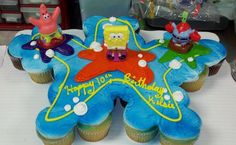 the cupcakes are decorated with spongebob characters and stars on top of them