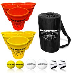 four buckets and six balls are shown in front of a black bag with white lettering on it