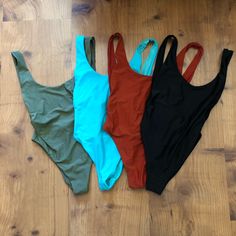 Aerie Superscoop One Piece. Super Cute And Flattering. Olive Green Is Only One Used, But In Good Condition. All Are Size Small- From Left To Right: Olive: Small, Used, But In Good Condition Fall Mint - Sold Maroon Lagoon (Red): Sold True Black: Small, New With Liner And Tags All Were Orginally $44.95. Am Willing To Sell Separately, Reach Out With Any Questions! Aerie Bathing Suits, One Piece Full, Orange One Piece, Navy One Piece, Wrap Swimsuit, Aerie Swim, Red One Piece, Blue One Piece Swimsuit, Blue One Piece