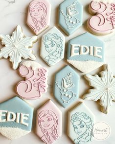 decorated cookies are arranged in the shape of hexagons and snowflakes