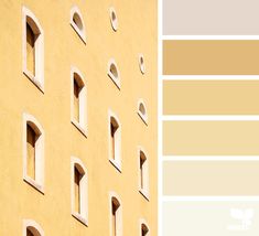 a yellow building with several windows and some paint swatches on the side, all in different shades