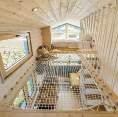 the inside of a tiny house with lots of windows