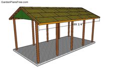 a wooden shelter with a green roof and shinning on the top, is shown