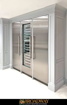 a large stainless steel refrigerator in a kitchen