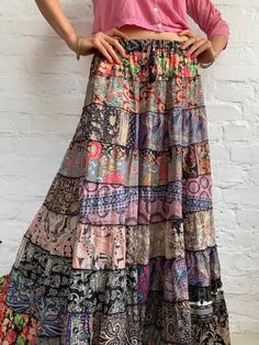 This gorgeous colourful gypsie skirt is all fun to wear, boho style inspired long and flowy true hippy girl skirt it is free size and floor length always one of a kind patchwork, made of varieties of different fabrics with floral patterns, very easy to wear and comfy it has elasticated waist band, and will fit most of sizes S-L MEASURE One Size Fits Most length 39 inch/100 cm waist 28-40 inch / 66-100cm CARE * Hand wash recommended * Hang to dry It is perfect outfit for everyday and evenings out Bohemian Floral Patchwork Bottoms For Festival, Flowy Boho Print Tiered Maxi Skirt, Flowy Maxi Skirt With Boho Print, Bohemian Wide Leg Maxi Dress For Spring, Flowy Boho Print Hippie Maxi Skirt, Hippie Boho Print Flowy Maxi Skirt, Hippie Flowy Boho Print Maxi Skirt, Hippie Style Flowy Maxi Skirt With Boho Print, Hippie Flowy Maxi Skirt With Boho Print