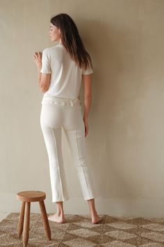 The Rib Kick Flare, our favorite seasonless essential. Crafted with our ultra-flattering and comfortable Rib fabric, featuring a fine rib texture, pintucked detailing, high-rise fit and kick flare. Set it up with — The Pop Button Down or The Rib Tank Made in LA Fitted Ribbed Athleisure Pants, Fitted Ribbed Pants For Athleisure, Fitted Bottoms With Cropped Leg And Seam Detailing, Fitted Bottoms With Seam Detailing And Cropped Leg, Casual Fitted Bottoms With Seam Detailing, Spring Ribbed Elastane Pants, Fitted Bottoms With Seam Detailing For Spring, Fitted Cropped Leg Loungewear Pants, Fitted Pants With Straight Hem For Loungewear