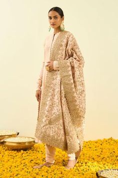 Rose pink dupatta with Kashmiri tilla embroidery in floral, paisley motifs and bead work hem.
Component: 1
Pattern: Embroidered
Type Of Work: Tilla
Fabric: Raw Silk
Color: Pink
Other Details: 
Note: Kurta and pant worn by the model is not for sale
Occasion: Wedding,Mehendi - Aza Fashions Kashmiri Tilla Embroidery, Tilla Embroidery, Wedding Mehendi, Pink Dupatta, Paisley Motifs, Baby Patchwork Quilt, Celebrity Closet, Desi Clothes, Embroidered Dupatta