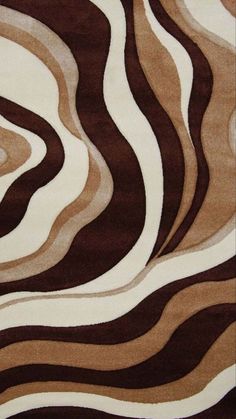 an animal print rug is shown in brown and white