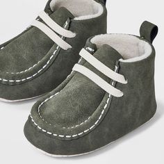 These Baby Chukka Boots - Cat & Jack™ in Green are an adorable addition to your little one’s wardrobe. Its soft shearling material for the insole with a blended polyester outsole, keeps your little one’s feet warm and cozy. With an easy pull-on feature, makes it comfortable and convenient to wear at picnics or playdates. These boots add a dash of style to every outfit. Cat & Jack™: Designed for all children so you can trust it's made for yours. Baby Winter Boots, Jack Green, Baby Green, Comfy Boot, Solids For Baby, Fisherman Sandals, Brown Sneakers, Baby Winter, Girls Sneakers