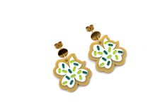 Indulge in the sweetness of St. Patrick's Day with these delightful clover heart cookie earrings, the perfect accessory to add a touch of whimsy and charm to your ensemble! They feature hand-painted layered acrylic clover-shaped cookie charms and are finished off with a stainless steel ear post. MATERIALS Acrylic Stainless Steel Ear Posts LENGTH 1 1/4" CARE Direct contact with perfumes and moisture should be avoided to minimize damage or discoloration. Please remove before showering, swimming or Clover Cookie, Cookie Earrings, Heart Cookie, Heart Cookies, Shaped Cookie, Gold Earrings, Charms, Swimming, Hand Painted