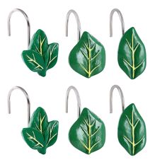 four green leaf shaped hooks with metal handles