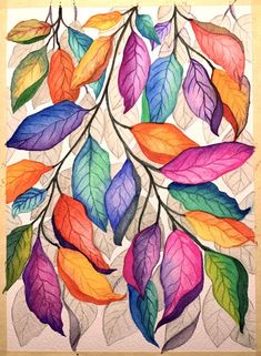 a painting of colorful leaves on a piece of paper with watercolor pencils in it