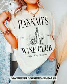 a woman wearing a t - shirt with the words hannah's wine club on it