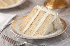 a slice of cake sitting on top of a plate next to a knife and fork