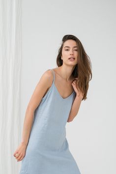 "Simple TILDA cami dress in light blue. - length is ± 92 cm (36.2\") (depends on size) - without pockets - relaxed fit DETAILS: - 100 % European, pre-washed medium weight linen (205 g/m²) - the model is 180 cm (5′11″) high, wearing size S. - model measurements: bust 84 cm (33\") / waist 61 cm (24\") / hips 92 cm (36\") - color in the picture - light blue (you can choose other color on the right) MADE TO ORDER: All pieces are made to order, it will take up to 10 work days to complete your order. Linen Cami Dress, Classic Linen Dress, Linen Nightgown, Linen Loose Dress, Linen Slip Dress, Linen Summer Dress, Natural Linen Dress, Blue Linen Dress, Linen Sundress