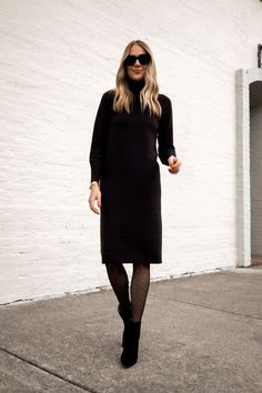 Fashion Jackson Wearing Ann Taylor Black Turtleneck Sweater Dress with Booties Black Ankle Booties Black Dot Tights, black sweater dress, black dress with tights, black dress for work, chic work outfit, womens work outfit, womens holiday party outfit, holiday party outfit, Christmas party outfit, black booties outfit How To Style Tights, Dress With Ankle Boots, Dress Booties, Booties Outfit, Maxi Dress Outfit, Work Chic, Wearing All Black, Fashion Jackson, Black Sweater Dress