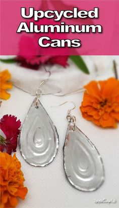 an image of earrings with text overlay that reads upcycled aluminum can't