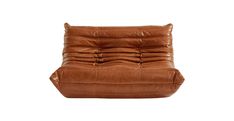 a brown leather reclining chair with pillows on it's back and the seat folded up