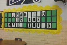 there is a sign on the wall that says learning is the main thing in this classroom