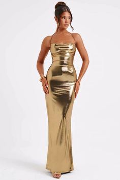 This Satin Backless Sexy Maxi Dress is a must-have for any femme fatale. The bodycon silhouette and spaghetti straps accentuate your curves, while the satin material adds a touch of luxury. Perfect for club parties or a night out, this dress is both bold and elegant. Glamorous Strapless Satin Dress For Party, Fitted Satin Dress With Spaghetti Straps For Prom, Flirty Satin Dress With Spaghetti Straps For Evening, Flirty Satin Dress With Spaghetti Straps For Night Out, Glamorous Fitted Satin Party Dress, Flirty Satin Backless Bodycon Dress, Satin Halter Neck Bodycon Dress For Party, Satin Halter Neck Bodycon Dress For Date Night, Halter Neck Satin Bodycon Dress For Date Night