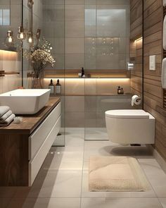 a modern bathroom with two sinks and a toilet