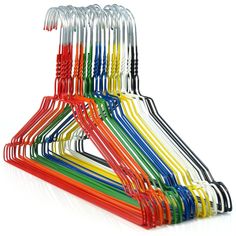 an assortment of colored plastic straws on a white background with clippings in the middle