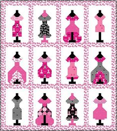 a pink quilt with black and white designs on it's sides, including two mannequins