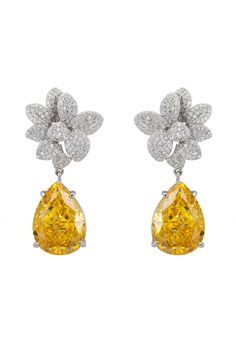 These Orchid Flower Teardrop Yellow Topaz Earrings are more than just jewellery; they're a statement of elegance. Weighing 11.0 grams, they're crafted from high-quality 925 silver, ensuring durability and lasting shine. The floral-inspired design at the top, adorned with sparkling cubic zirconia, celebrates the beauty of nature and is perfectly complemented by a teardrop-shaped lab-created yellow topaz gemstone that dangles below. Yellow topaz, the birthstone for November, is cherished for its s Luxury Yellow Teardrop Earrings, Yellow Flower Shaped Jewelry For Formal Occasions, Yellow Flower-shaped Formal Jewelry, Formal Yellow Flower-shaped Jewelry, Formal Yellow Flower-shaped Earrings, Elegant Yellow Pear-shaped Earrings, Elegant Pear-shaped Yellow Earrings, Formal Diamond Drop Flower Earrings, Topaz Earrings