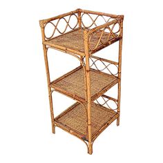 a three tier bamboo shelf with wicker shelves