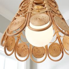 a wooden chandelier hanging from the ceiling