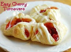 three pastries on a white plate with the words easy cherry turnoverers