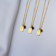 "Stylish and minimalist 14K gold birthstone tag necklace for everyday wear. Great for layering.  Unique personalized gift idea to show love to the important people in your life with a cute, dainty, and creative gift. The custom vertical bar name necklace with birthstone makes a perfect birthday gift for mothers, friends or yourself.  A special birthday gift for significant others. Just engrave his/her name. Select his/her birthstone. It is a perfect gift. It can be dressed up or dressed down dep Everyday Charm Necklaces With May Birthstone Initial Pendant, Gold Birthstone Necklace For May Personalized Gift, Everyday Initial Pendant Birthstone Necklace, Personalized Birthstone Pendant Necklace For Everyday, Everyday Birthstone Initial Pendant Necklace, Gold Charm Necklaces For May Birthstone Personalized Gift, Elegant Everyday Name Necklace With Birthstone, Elegant Personalized Birthstone Necklace For Everyday, Personalized Everyday Birthstone Necklace For May