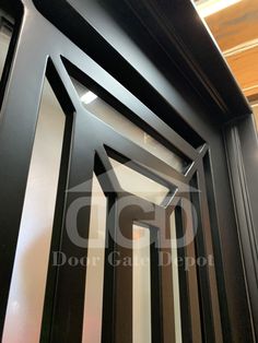 an open door with black and white stripes on it