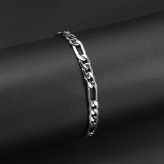 The Stainless Steel Figaro Chain Bracelet is the epitome of a versatile rugged or classic accent piece. Designed with a sleek polished finish, this bracelet is also great for special occasions. Available in widths from 3mm to 12mm you up your style with a variety of looks from the accent of the 3mm to a bolder look wit Bf Clothes, Silver Bracelet Designs, Mens Cuff Bracelets, Mens Cuff, Biker Jewelry, Silver Bracelets For Women, Mens Bracelet Silver, Jewelry Accessories Ideas, Hand Bracelet