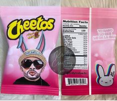 a bag of cheetos sitting on top of a bed next to a sticker