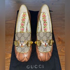 Sz Eu 37.5/Us 6.5 Brown Colorblock: Python, Gucci Monogram Loafer Style Gold Hardware Tiger Detail Front Gold Mirrored Block Heel-2in Floral Inner Pattern No Box, Has Dust Bag Excellent Used Condition Retails For $1,150 Rare Print Gucci Monogram Loafer, Loafer Style, Shoes Gucci, Gucci Monogram, Loafers Style, Gucci Shoes, Python, Flat Shoes Women, Gold Hardware