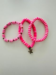 Preppy pink is a bracelet collection are perfect for pink lovers! All bracelets are pink with some a little bit of gold. Pink Heishi Beads Beaded Bracelets, Trendy Pink Beaded Bracelets With Letter Beads, Playful Pink Bracelets With Round Beads, Playful Pink Beaded Bracelets, Playful Pink Beaded Stretch Bracelet, Pink Heishi Beads Colorful Beaded Bracelets, Trendy Pink Heishi Beads Bracelet, Playful Pink Jewelry With Letter Beads, Pink Heishi Beaded Bracelets With Colorful Beads