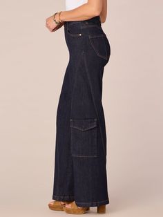 It’ll be love at first fit when you slip into these on-trend “Ab”solution® Wide Leg jeans, featuring a skyrise waist, cargo pockets, and an uneven yoke. With our signature fit technology, these bottoms will feel like they’re made with you in mind, thanks to strategically placed back pockets, a hidden “no gap” elastic waistband, and ultra-soft stretchy denim.• Skyrise• Dark indigo• Stretch smooth denim• 2% spandex• Button front and zip fly closure• Cargo pockets• Uneven yoke• Strategically placed back pockets• Hidden “no gap” elastic waistbandStyle# B28217KSL• Skyrise approx. 11”• Inseam approx. 32”• Leg opening approx. 24” Be Love, Indigo Denim, Dark Indigo, Cargo Pocket, Cargo Pant, Love At First, Jeans For Sale, Wide Leg Jeans, Leg Jeans