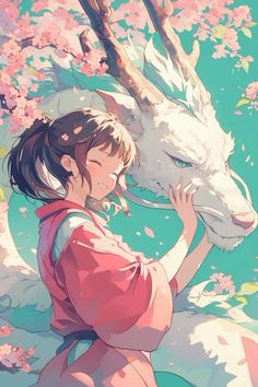 a girl is petting an animal in front of flowers