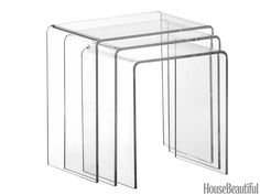 three clear plastic nesting tables on white background