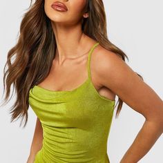 Slinky Halter Mini Dress Spaghetti Straps Fully Lined New With Tags Stretchy Material Shell: 91% Polyester,8% Spandex Lining: 100% Polyester Color: Lime Green Size: M Bust: 27” Length: 30” The Halter Mini Dress In Lime Green Is A Striking And Chic Garment That Is Sure To Turn Heads. With Its Halter Neckline, This Dress Highlights The Shoulders And Neck, Adding A Touch Of Elegance To The Overall Look. The Mini Length Showcases Your Legs And Creates A Flirty And Youthful Appeal. The Slinky Fabric Fitted Green Cami Mini Dress, Yellow Ruched Bodycon Dress For Party, Flirty Green Top For Party, Yellow Stretch Bodycon Party Dress, Yellow Stretch Bodycon Dress For Party, Green Cami Dress For Party, Yellow Ruched Bodycon Dress For Night Out, Yellow Cami Top For Party, Yellow Ruched Bodycon Dress